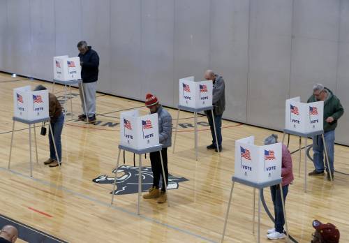Voters cast their ballots at precincts nine and ten inside the gymnasium at Kennedy Elementary School in Pontiac on Election Day on Tuesday, Nov 8, 2022.Electionday 110822 Es08