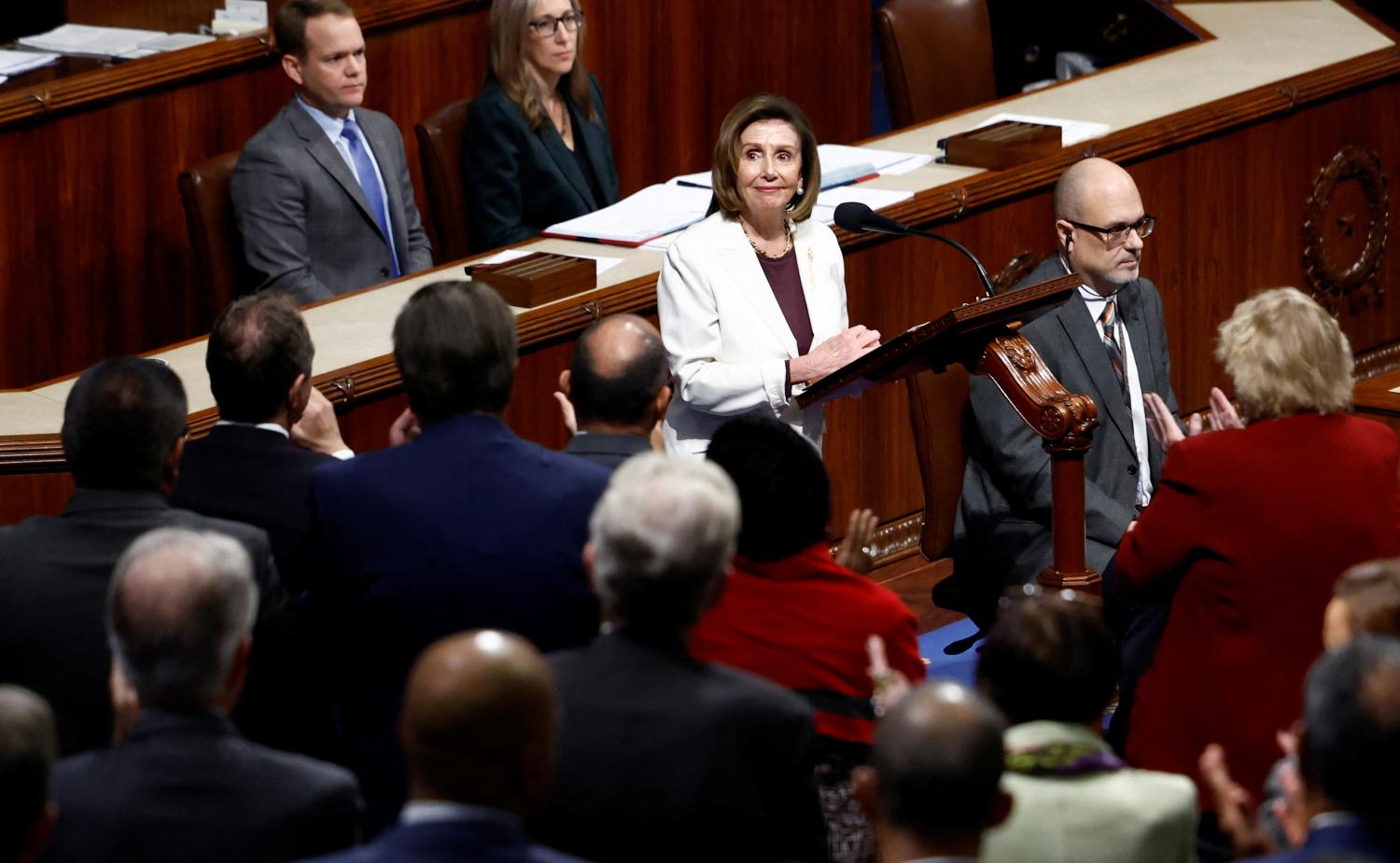 U.S. House Speaker Nancy Pelosi (D-CA) listens to applause from her House colleagues after Pelosi announced that she will remain in Congress but will not run for re-election as Speaker of the House after Republicans were projected to win control of the House of Representatives, on the floor of the House Chamber of the U.S. Capitol in Washington, U.S., November 17, 2022. REUTERS/Evelyn Hockstein