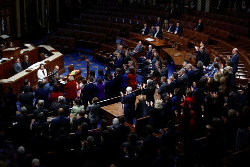 U.S. House Speaker Nancy Pelosi (D-CA) faces an overwhelmingly empty Republican section of the House chamber as she is applauded by her Democratic colleagues after announcing that she will remain in Congress but will not run for re-election as Speaker after Republicans were projected to win control of the House of Representatives, on the floor of the House Chamber of the U.S. Capitol in Washington, U.S., November 17, 2022. REUTERS/Evelyn Hockstein