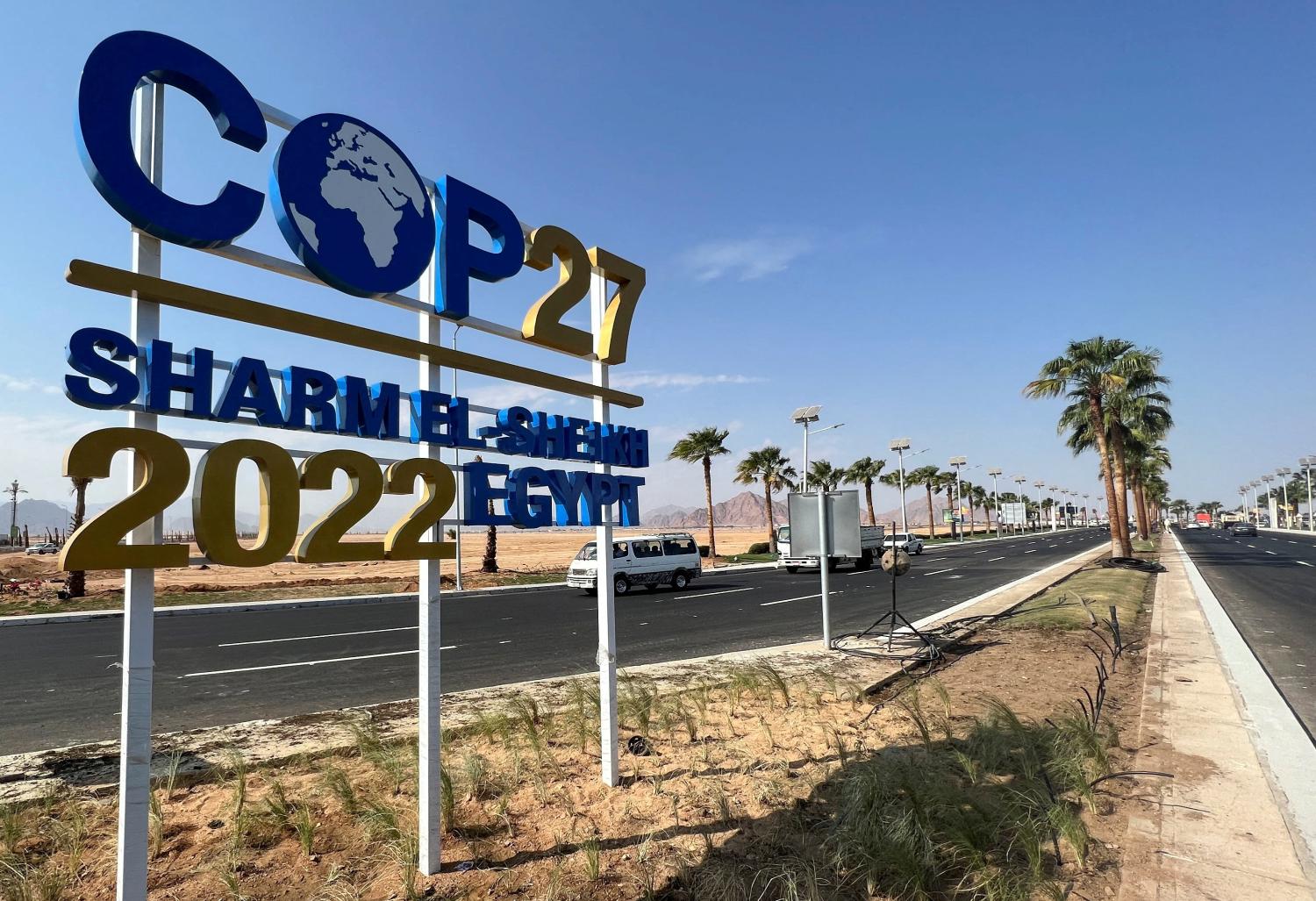 FILE PHOTO: View of a COP27 sign on the road leading to the conference area in Egypt's Red Sea resort of Sharm el-Sheikh town as the city prepares to host the COP27 summit next month, in Sharm el-Sheikh, Egypt October 20, 2022. REUTERS/Sayed Sheasha/File Photo