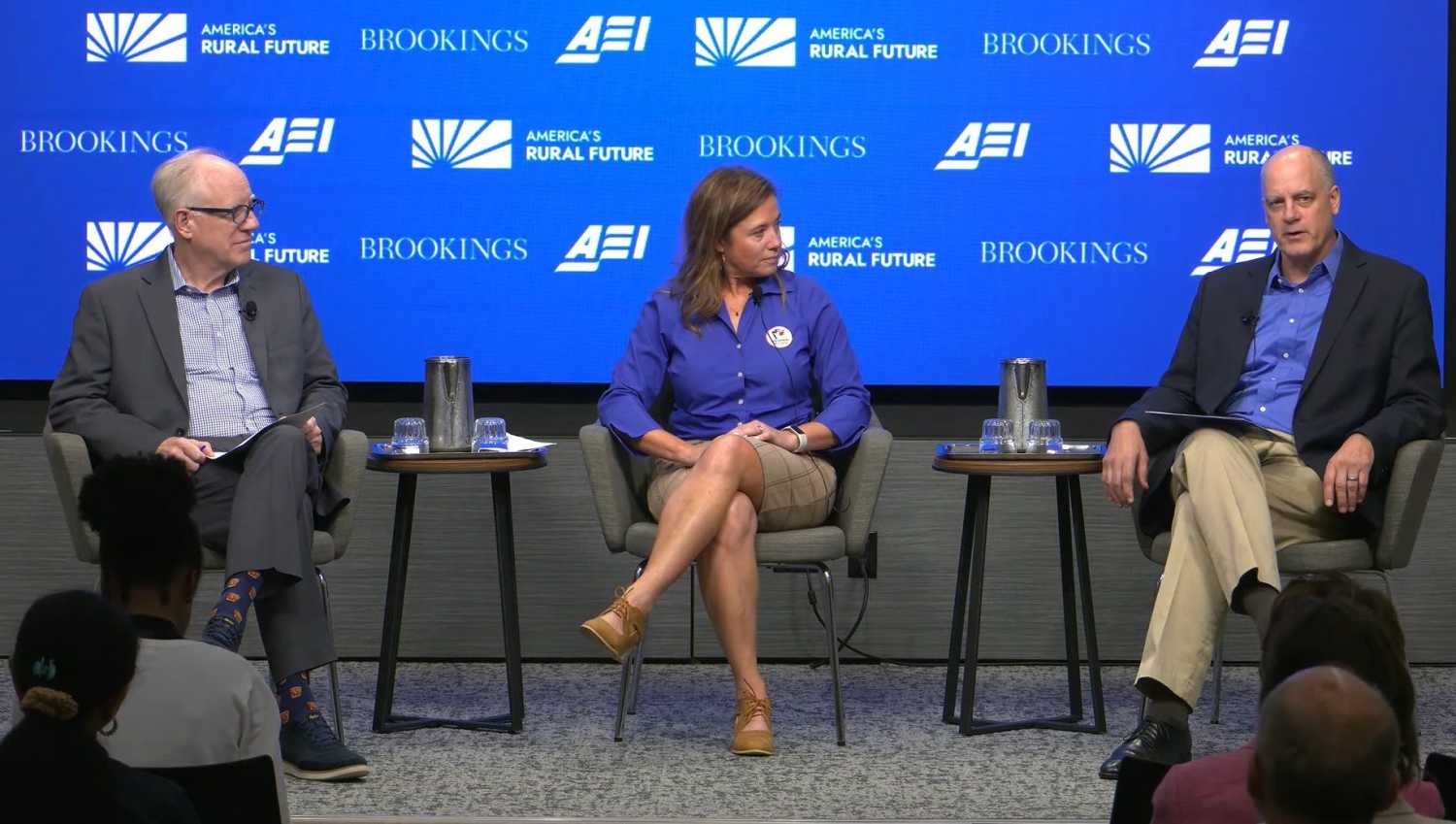 Brent Orrell, Tataboline Enos, and Anthony F. Pipa on stage