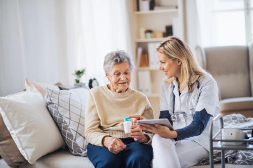 health visitor with elderly woman