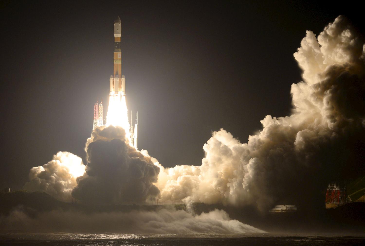 A Japanese H-2B rocket carrying cargo for the International Space Station blasts off from Tanegashima Space Center. (REUTERS/Kyodo)