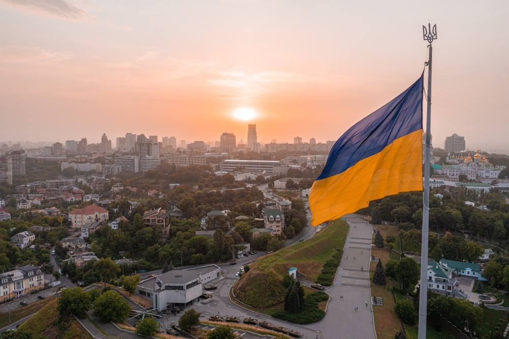 Flag of Ukraine over city