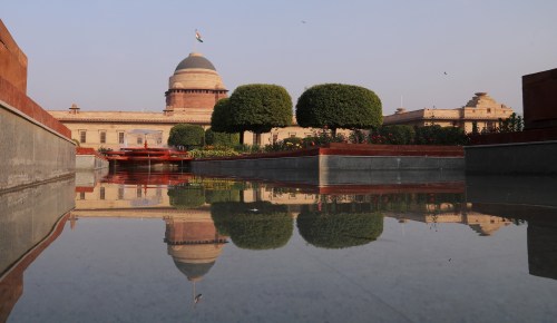 Rashtrapati Bhavan (The Presidential Palace) reflection in water at the Mughal Gardens during a press preview.The Mughal garden reopen for the general public from February 13th to March 21st for seven hours from 10 AM to 5 PM. The visitors book their slots through online registration. The historical building was closed for the general public due to the Covid-19 Pandemic. (Photo by Naveen Sharma / SOPA Images/Sipa USA)No Use Germany.