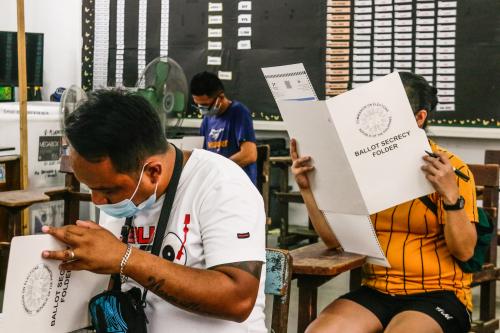 Scene inside polling precinct during the National and Local Elections in Metro Manila, Philippines on May 9, 2022. Filipinos cast their votes during the 2022 Philippine Election. (Photo by Ryan Eduard Benaid/NurPhoto)NO USE FRANCE