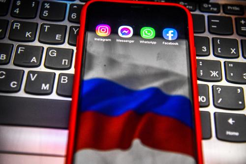 In this photo illustration, the app icons of Instagram, Messenger, WhatsApp and Facebook are displayed on a smartphone screen with the background of the flag of Russia. (Photo by Daniel Felipe Kutepov / SOPA Images/Sipa USA)No Use Germany.
