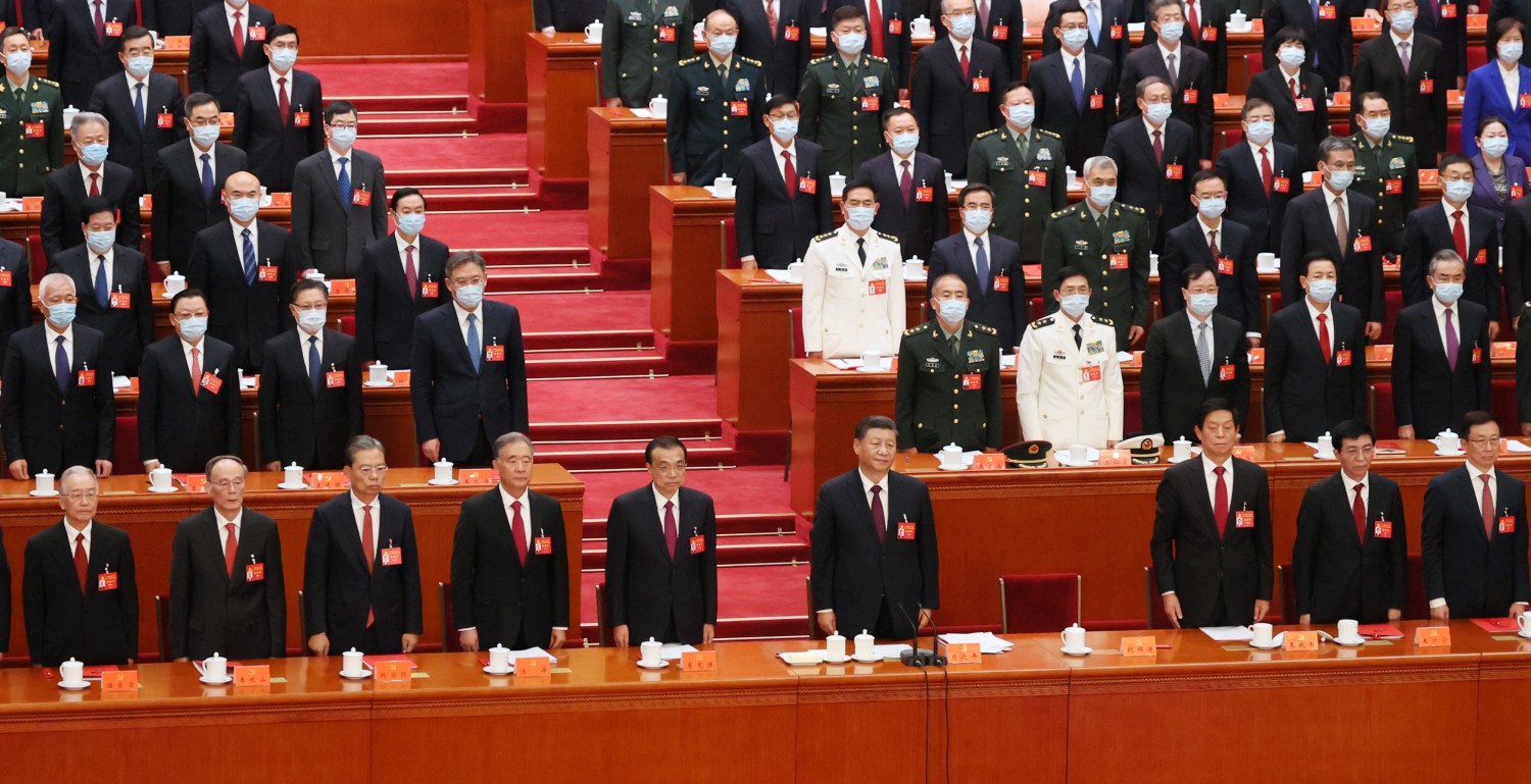 Chinese President Xi Jinping (center) stands in the closing ceremony of the 20th Party Congress, where he affirmed China's commitment to AI development and "intelligent warfare." (Koki Kataoka/The Yomiuri Shimbun).