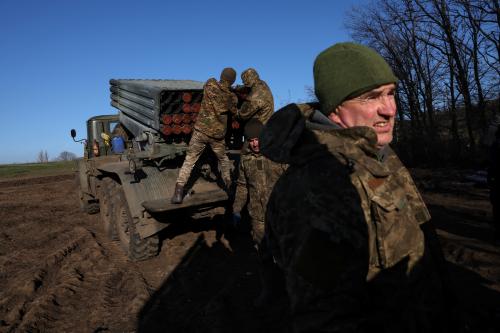 Service members with the Ukrainian Army's 10th Mountain Assault Brigade unit prepare a BM-21 Grad self- propelled multiple rocket launcher, as Russia's attack on Ukraine continues, for launching near the frontlines in the Bakhmut region of Ukraine, December 7, 2022. REUTERS/Shannon Stapleton