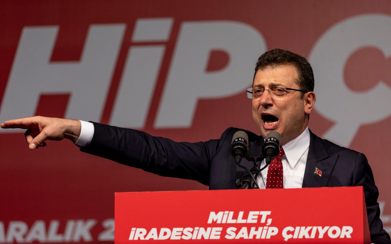 Istanbul Mayor Ekrem Imamoglu addresses his supporters during a rally to oppose the conviction and political ban of himself, a popular rival to Recep Tayyip Erdogan, the President of Turkey, in Istanbul, Turkey, December 15, 2022. REUTERS/Umit Bektas