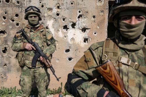 13 February 2019, Syria, Aleppo: Fighters of Hayat Tahrir al-Sham militant group hold their weapons at the front lines of the armed opposition overlooking the Syrian government-held city of Aleppo. Russian Foreign Minister Sergey Lavrov said on Wednesday that Russia will continue to make every possible effort to assist Syria in liberating the country from lawlessness committed by armed groups. Photo: Anas Alkharboutli/dpa