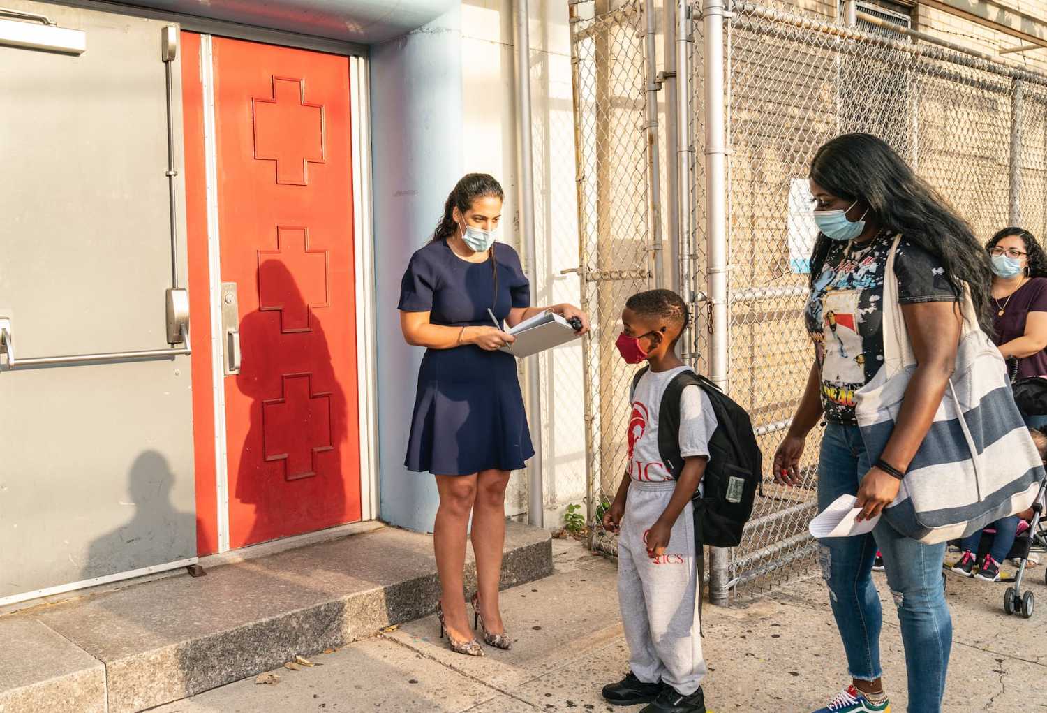 Children attend first day of in-person learning at Catholic schools in the Archdiocese of New York at Immaculate Conception School in the Bronx, New York on September 9, 2020. Superintendent of Schools for the Archdiocese of New York Michael J. Deegan and Principal Amy Rodriquez greet children and parents at entrance. (Photo by Lev Radin/Sipa USA)