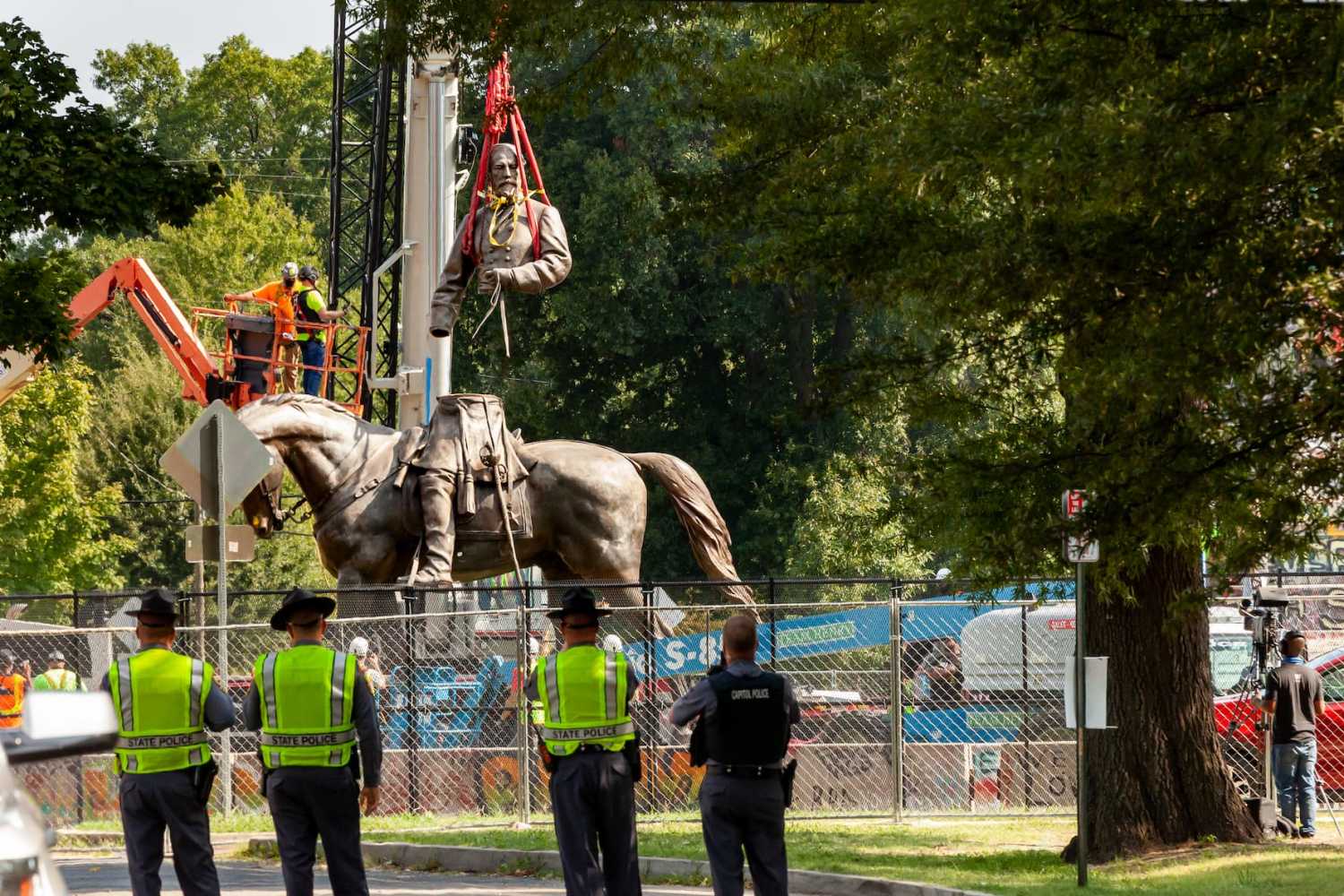 The head and torso of the statue of Confederate general Robert E. Lee are separated for transport following the statue's removal. The Virginia supreme court ruled last week that the six-story monument could be removed. It has yet to be determined whether the pedestal covered in anti-racism graffiti will be removed given its prominent role in the 2020 anti-racism uprising in Richmond. (Photo by Allison Bailey/NurPhoto)