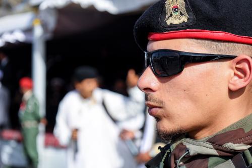 One of the Libyan army guards seen during the celebration in Misrata. Libyan security forces affiliated with Tripoli-based interim Prime Minister Abdelhamid Dbeibah take part in a parade marking the 6th anniversary of the liberation of Sirte from the Islamic State (IS) group, in the northwestern city of Misrata. (Photo by Islam Alatrash / SOPA Images/Sipa USA)No Use Germany.