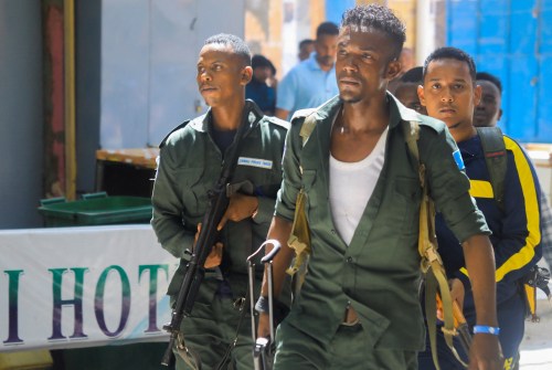 Somali policemen prepare to take their positions near the mayor's office following a blast in Mogadishu, Somalia January 22, 2023. REUTERS/Feisal Omar