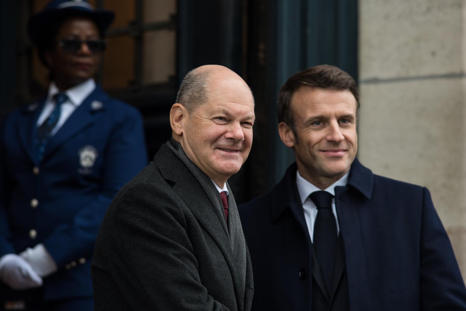 German Chancellor Olaf Scholz and French President Emmanuel Macron at the entrance of the Sorbonne during the Franco-German summit for the 60th anniversary of the Elysee Treaty, in Paris, 22 January, 2023. (Photo by Andrea Savorani Neri/NurPhoto)NO USE FRANCE