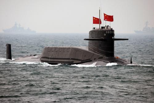 A Chinese Navy nuclear submarine takes part in an international fleet review to celebrate the 60th anniversary of the founding of the People's Liberation Army Navy, April 2009.