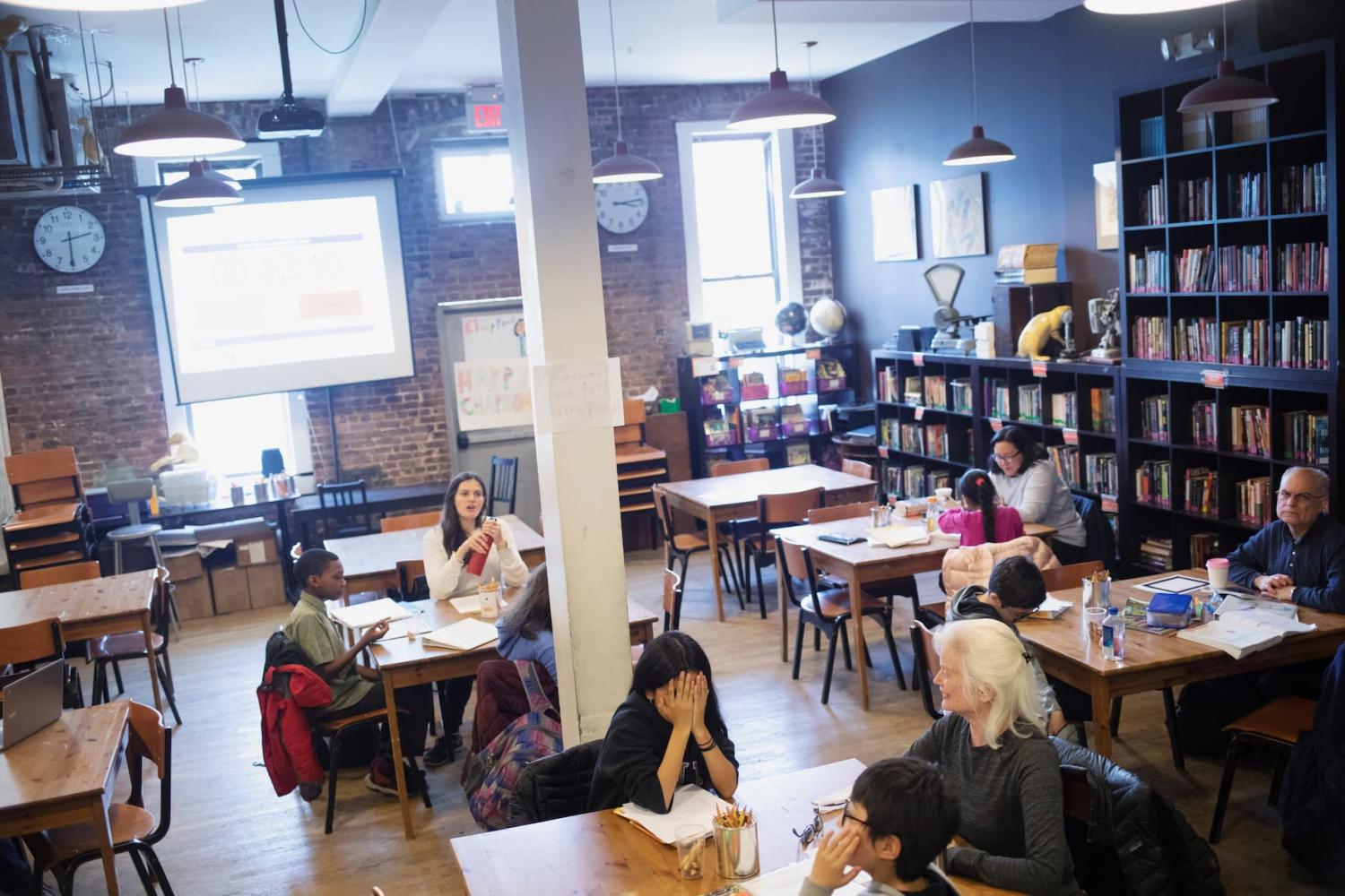 Students take part in after school programs at the educational nonprofit 826NYC in the back of the Brooklyn Superhero Supply Co. store in the Brooklyn borough of New York, U.S., March 28, 2019. Pictures taken March 28, 2019. REUTERS/Lucas Jackson