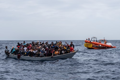 GEO BARENTS: The MSF SAR teams (Search and Rescue) are rescuing 99 people on a wooden boat in the Libya SAR zone. Women, men and children were on distress since hours as the boat was taking water and was overcrowded. At the end of the rescue, 10 lifeless bodies were discovered in the bottom of the boat. These people, including 5 minors, died of suffocation hours before the rescue, the 16th November 2021. In May 2021, Medecins Sans Frontieres (MSF) has relaunched its search and rescue (SAR) activities in the central Mediterranean Sea to save the lives of refugees and migrants attempting the deadly sea crossing from Libya. For this purpose, they are using their own chartered ship, the Geo Barents. Photo by Virginie Nguyen Hoang / Hans Lucas GEO BARENTS : Les equipes SAR de MSF (Search and Rescue) ont sauve 99 personnes sur un bateau en bois dans la zone SAR de la Libye. Des femmes, des hommes et des enfants etaient en detresse depuis pres de 13 heures dans un bateau qui commencait a prendre l eau et en surcharge. A la fin du sauvetage, 10 corps sans vie ont ete decouverts dans le fond du bateau. Ces personnes, dont 5 mineurs, sont mortes par suffocation des heures avant le sauvetage, le 16 novembre 2021, le 16 novembre 2021. En mai 2021, Medecins Sans Frontieres (MSF) a relance ses activites de recherche et sauvetage (SAR) en Mediterranee centrale pour sauver la vie des refugies et des migrants tentant la traversee maritime meurtriere depuis la Libye. A cette fin, ils utilisent leur propre navire affrete, le Geo Barents. Photo de Virginie Nguyen Hoang / Hans Lucas