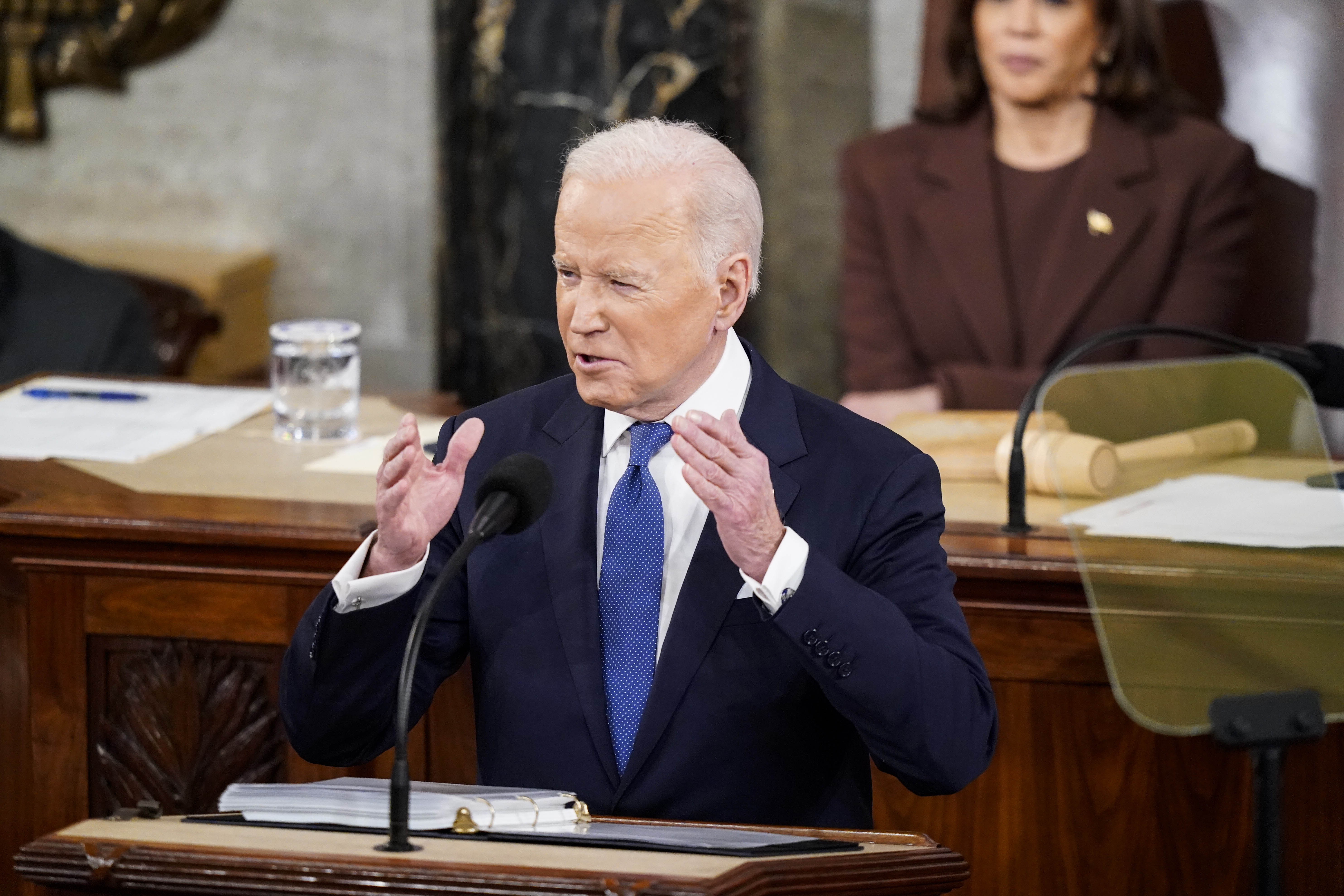 March 1, 2022; Washington, DC, USA; President Joe Biden, flanked by Vice President Kamala Harris, delivers his State of the Union address to a joint session of Congress on Capitol Hill on Tuesday, March 01, 2022 in Washington, DC.  Mandatory Credit: Jabin Botsford/Pool via USA TODAY NETWORK