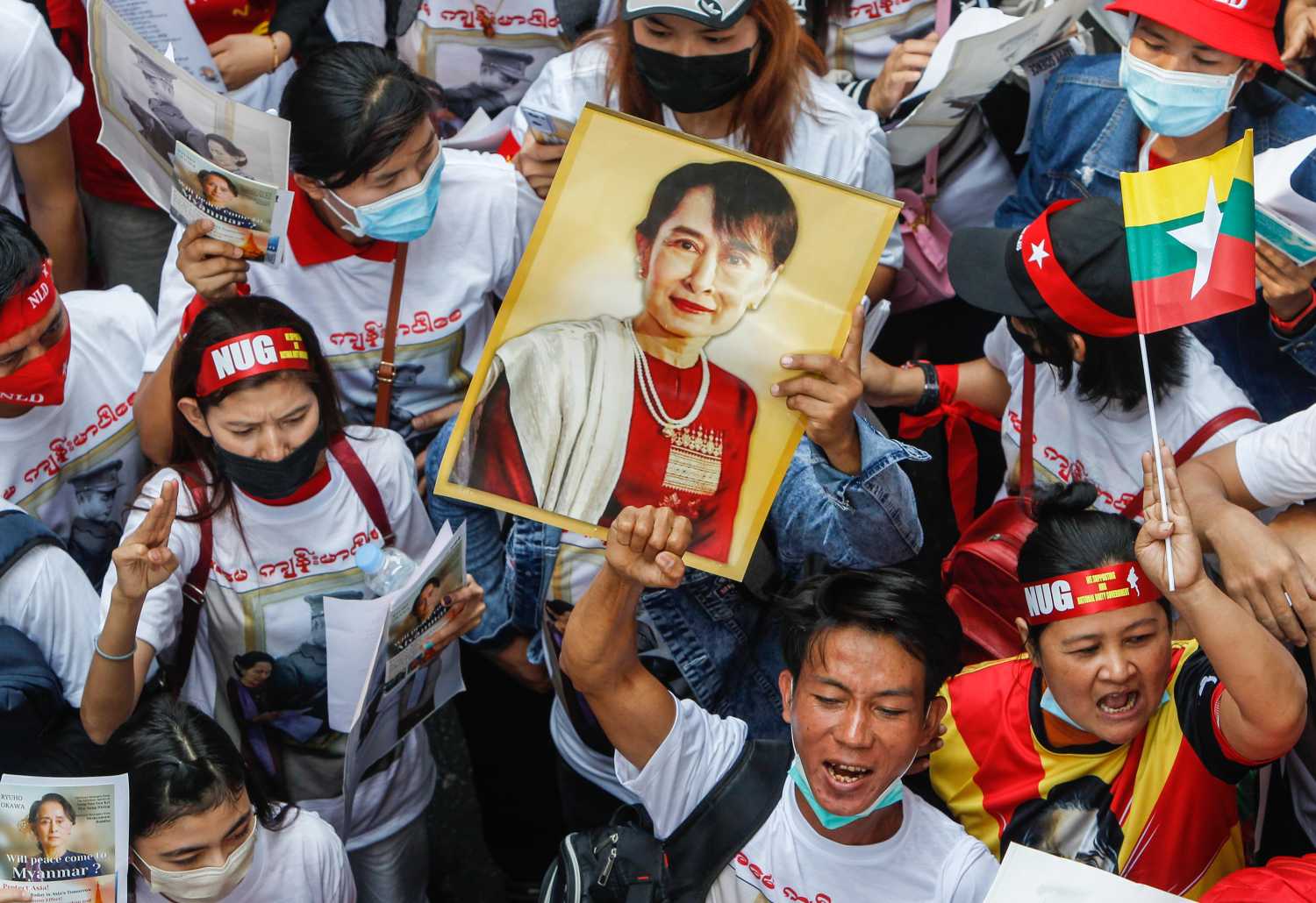 Demonstrators hold a portrait of pro-democracy icon Aung San Suu Ky and raise their three finger salute during a rally to mark the second anniversary of the coup in Myanmar outside the Myanmar embassy in Bangkok. Myanmar nationals living in Thailand hold a rally on the occasion of the second anniversary of the coup in Myanmar. Myanmar's military seized power on February 1, 2021, ousting the civilian government and arresting its de facto leader, Aung San Suu Kyi. (Photo by Chaiwat Subprasom / SOPA Images/Sipa USA)No Use Germany.