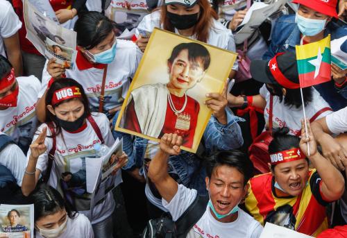 Demonstrators hold a portrait of pro-democracy icon Aung San Suu Ky and raise their three finger salute during a rally to mark the second anniversary of the coup in Myanmar outside the Myanmar embassy in Bangkok. Myanmar nationals living in Thailand hold a rally on the occasion of the second anniversary of the coup in Myanmar. Myanmar's military seized power on February 1, 2021, ousting the civilian government and arresting its de facto leader, Aung San Suu Kyi. (Photo by Chaiwat Subprasom / SOPA Images/Sipa USA)No Use Germany.