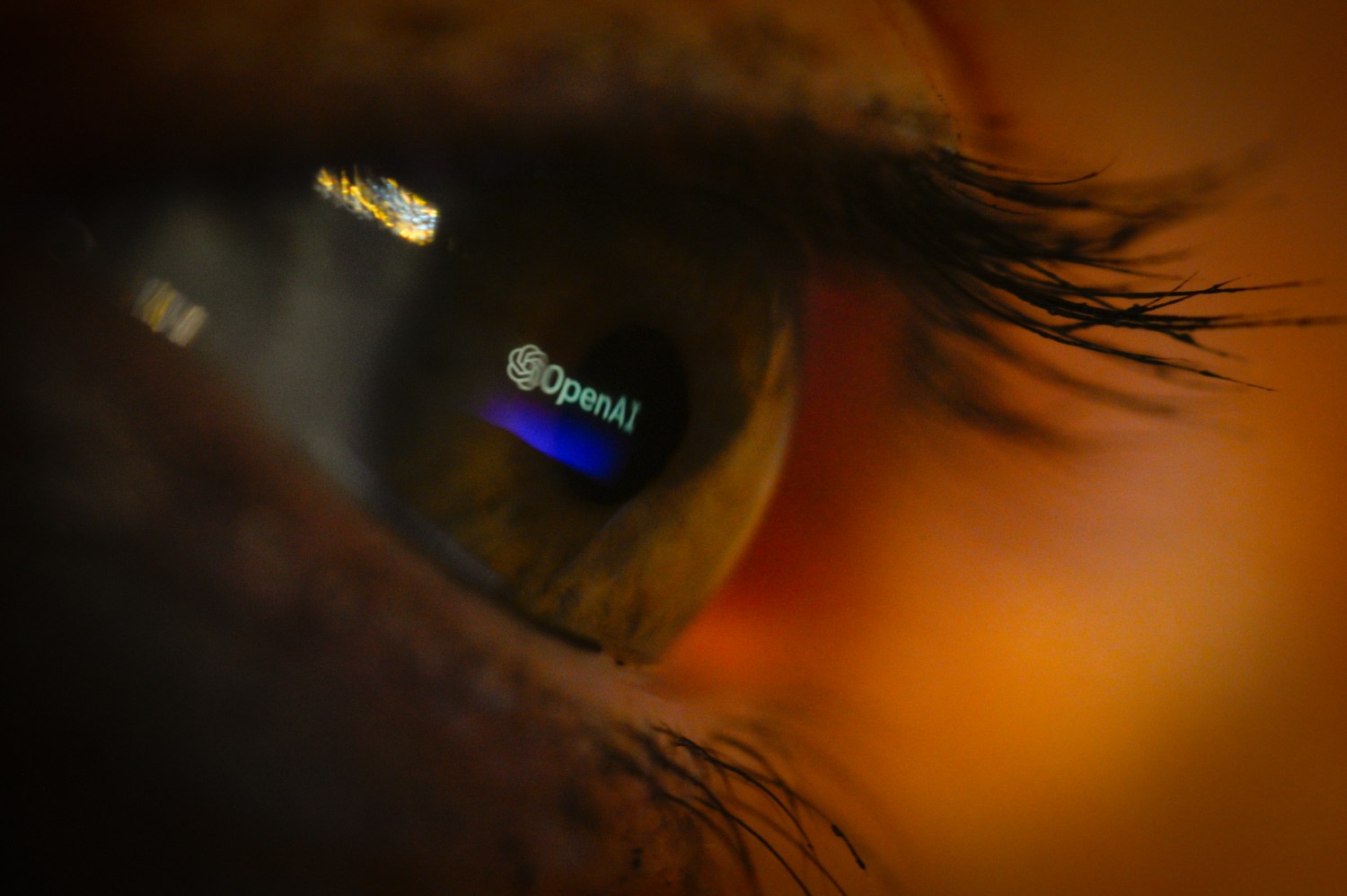 The OpenAI logo is seen reflected in an eye in this photo illustration in Warsaw, Poland on 04 February, 2023. (Photo by Jaap Arriens/NurPhoto)NO USE FRANCE