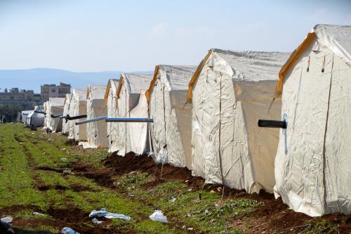 Displaced people from the earthquake in shelters and temporary camps on the outskirts of Jenderes, northwest Syria, on February 13, 2023.