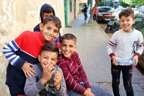 A group of Syrian children seen in a street in Beirut, Lebanon, on November 24, 2021. On November 23 UNICEF realesed the report Surviving without the basics; the ever-worsening impact of Lebanons crisis on children. The report is based on two surveys conducted by UNICEF in April 2021 and again in October 2021 among the same families.
The November 22 report shows an increase in the number of children going hungry, having to work to support their family, not going to school and and not getting the health care they need. The figures show a dramatic deterioration of living conditions over six months, with more than half of families having at least one child who skipped a meal in September, as compared with about 37 per cent in April. More than 30 per cent of surveyed families reported cuts on education expenses (up from 26 per cent in April). Almost 12 per cent of families who participated in UNICEFs survey sent children to work in September, as compared with close to 9 per cent in April. The crisis is also having a severe impact on childrens health. Almost 34 per cent of children who required primary health care did not receive it, up from 28 per cent in April. The figures are even starker for Syrian refugee families, with almost 9 out of 10 living in extreme poverty.

 (Photo by Elisa Gestri/Sipa USA)
No Use Germany.