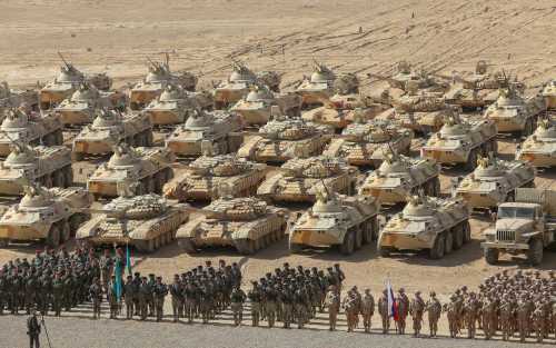 Russian, Kazakh and Belarusian service members line up during military drills carried out by the Russia-led Collective Security Treaty Organisation (CSTO) at the Harb-Maidon training ground, located near the Tajik-Afghan border in the Khatlon region, Tajikistan October 23, 2021. REUTERS/Didor Sadulloev