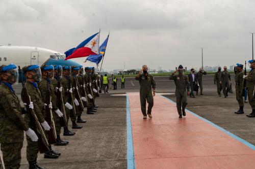 Handout photo dated October 13, 2021 shows Adm. John Aquilino, commander of U.S. Indo-Pacific Command, arrives at Clark Air Base in the Philippines. The United States and the Philippines on Thursday announced plans to expand America's military presence in the Southeast Asian nation, with access to four more bases as they seek to deter China’s increasingly aggressive actions toward Taiwan and in the disputed South China Sea. The agreement was reached as US Defense Secretary Lloyd Austin was in the country for talks about deploying US forces and weapons in more Philippine military camps. U.S. Navy photo by Capt. Pawel Puczko via ABACAPRESS.COM