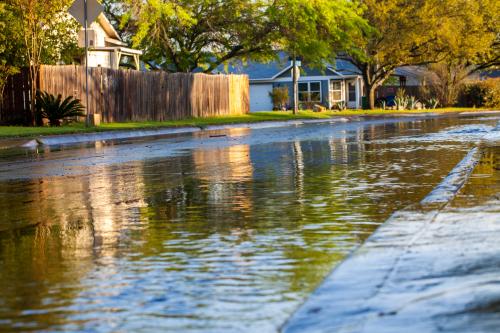 Flooded neighborhood street after thunderstorm