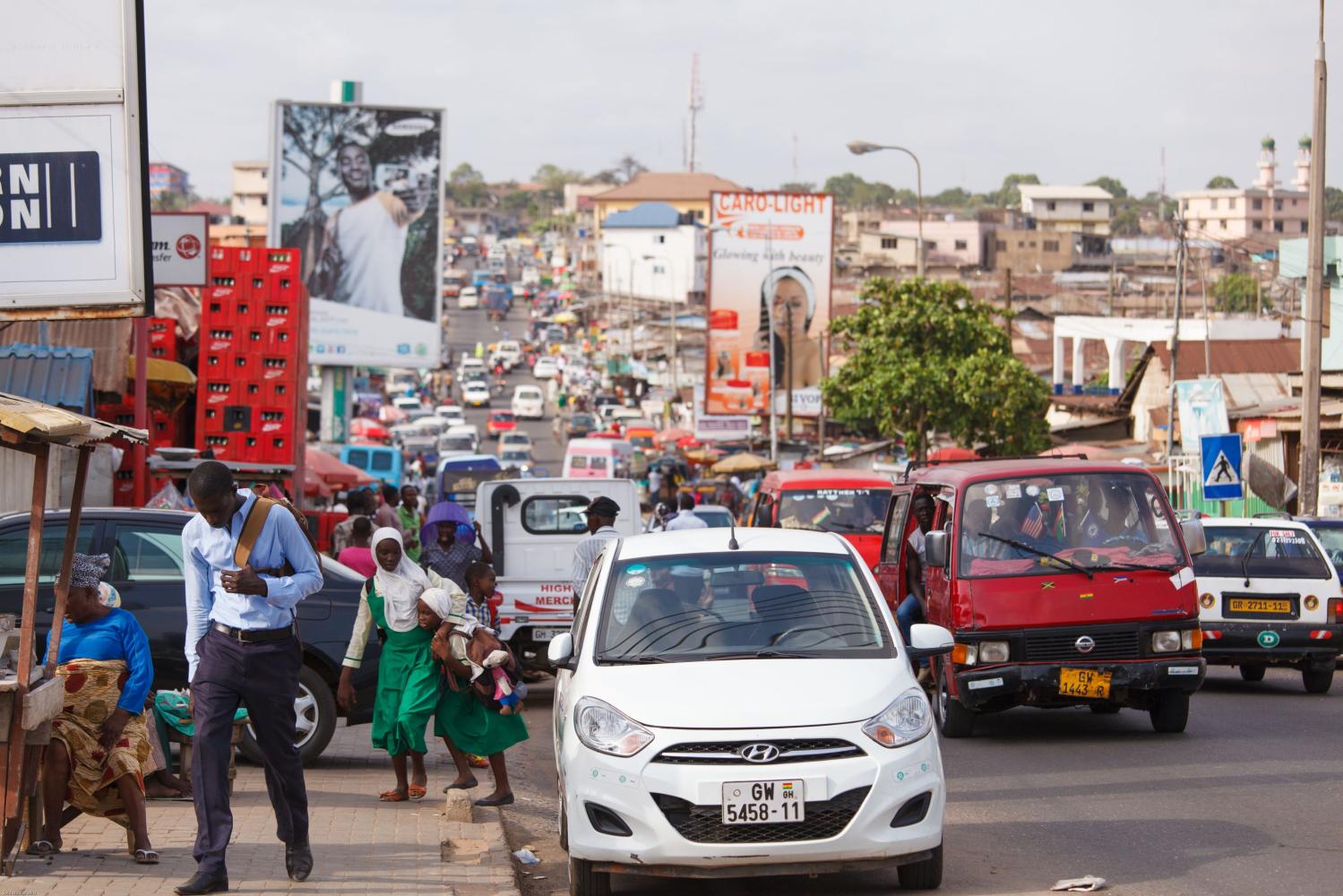 ACCRA, GHANA - MARCH 18: Traffic on road in Accra, capital city of Ghana on March 18, 2014 in Accra, Ghana.