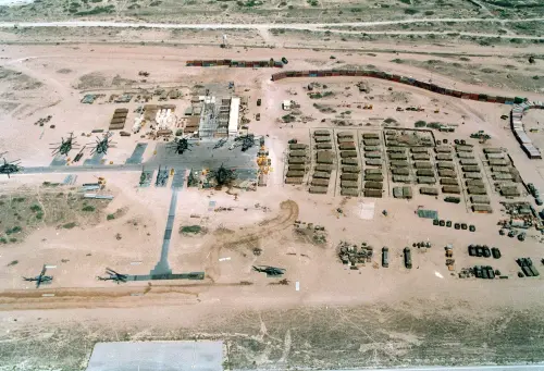 Base of the U.N. mostly U.S. Marine Forces in Somalia was built on an abandoned Soviet airfield in Mogadishu. Had a wall of shipping containers upper right to thwart random sniper fire. Feb. 25 1993.