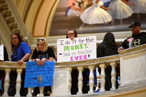 Teachers rally inside the state Capitol on the second day of a teacher walkout to demand higher pay and more funding for education in Oklahoma City, Oklahoma, U.S., April 3, 2018. REUTERS/Nick Oxford