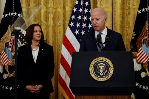 U.S. President Joe Biden speaks prior to signing of the Juneteenth National Independence Day Act into law as Vice President Kamala Harris stands by in the East Room of the White House in Washington, U.S., June 17, 2021. REUTERS/Carlos Barria