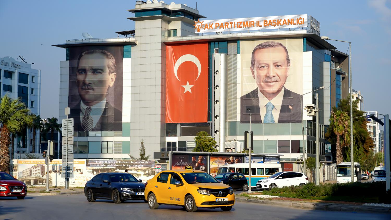 An exterior view of AK Party Izmir Provincial Directorate; The big poster of Turkey's president Recep Tayyip Erdogan, The Turkish flag and  the poster of Ataturk are hanged on the exterior of the building on October 30, 2021 in Bayrakl?, Izmir, Turkey. (Photo by Idil Toffolo/Pacific Press/Sipa USA)No Use Germany.