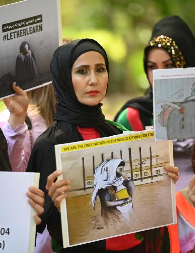 Members of the Australian Afghan community  gather for the Global Movement for the Rights of Afghan Women protest at Belmore Park in Sydney, Saturday, January 14, 2023. 
(AAP Image/Jeremy Piper) NO ARCHIVINGNo Use Australia. No Use New Zealand.