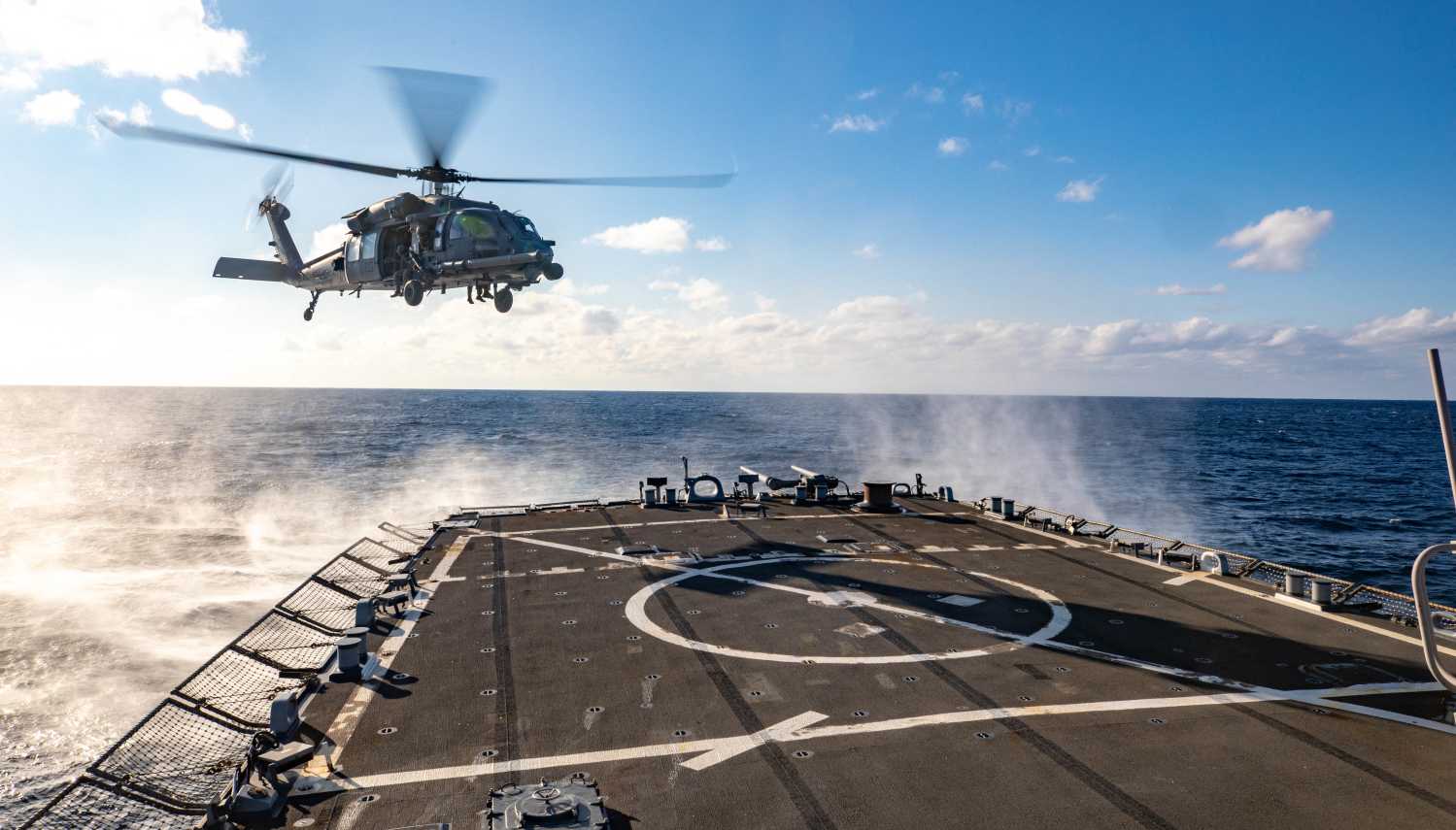 Handout photo dated January 26, 2023 shows Air Force 33rd Search and Rescue Squadron prepares to land aboard Arleigh Burke-class guided-missile destroyer USS Benfold (DDG 65) in the Philippine Sea. The United States and the Philippines on Thursday announced plans to expand America's military presence in the Southeast Asian nation, with access to four more bases as they seek to deter China’s increasingly aggressive actions toward Taiwan and in the disputed South China Sea. The agreement was reached as US Defense Secretary Lloyd Austin was in the country for talks about deploying US forces and weapons in more Philippine military camps. U.S. Navy photo by Mass Communication Specialist 3rd Class RuKiyah Mack via ABACAPRESS.COM