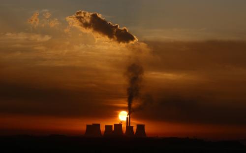 FILE PHOTO: The sun rises behind the cooling towers of Kendal Power Station, a coal-fired station ofÊSouth African utility Eskom, as the company's ageing coal-fired plants cause frequent power outages, near Witbank, in the Mpumalanga province, South Africa January 17, 2023. REUTERS/Siphiwe Sibeko/File Photo