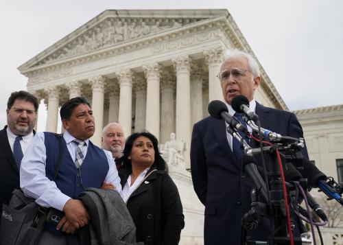 Beatriz Gonzalez and Jose Hernandez, the mother and stepfather of Nohemi Gonzalez who was fatally shot in the 2015 Paris attacks, listen to Attorney Eric Schnapper speak outside the U.S. Supreme Court after justices heard arguments in Gonzalez v. Google in Washington, U.S., February 21, 2023. REUTERS/Kevin Lamarque