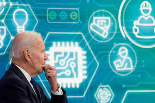 FILE PHOTO: U.S. President Joe Biden and Commerce Secretary Gina Raimondo (not pictured) hold a virtual meeting with business leaders and state governors to discuss supply chain problems, particularly addressing semiconductor chips, on the White House campus in Washington, U.S., March 9, 2022. REUTERS/Jonathan Ernst/File Photo