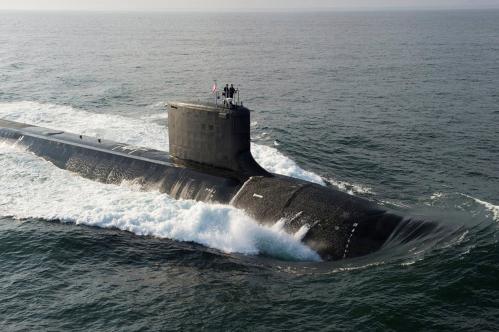 FILE PHOTO: The Virginia-class USS North Dakota (SSN 784) submarine is seen during bravo sea trials in this U.S. Navy handout picture taken in the Atlantic Ocean August 18, 2013. The Navy commissioned its newest attack submarine North Dakota, during a ceremony October 25, 2014, at Submarine Base New London in Groton, Connecticut, defense officials announced. REUTERS/U.S. Navy/Handout  (MID-SEA - Tags: MILITARY) THIS IMAGE HAS BEEN SUPPLIED BY A THIRD PARTY. IT IS DISTRIBUTED, EXACTLY AS RECEIVED BY REUTERS, AS A SERVICE TO CLIENTS. FOR EDITORIAL USE ONLY. NOT FOR SALE FOR MARKETING OR ADVERTISING CAMPAIGNS/File Photo