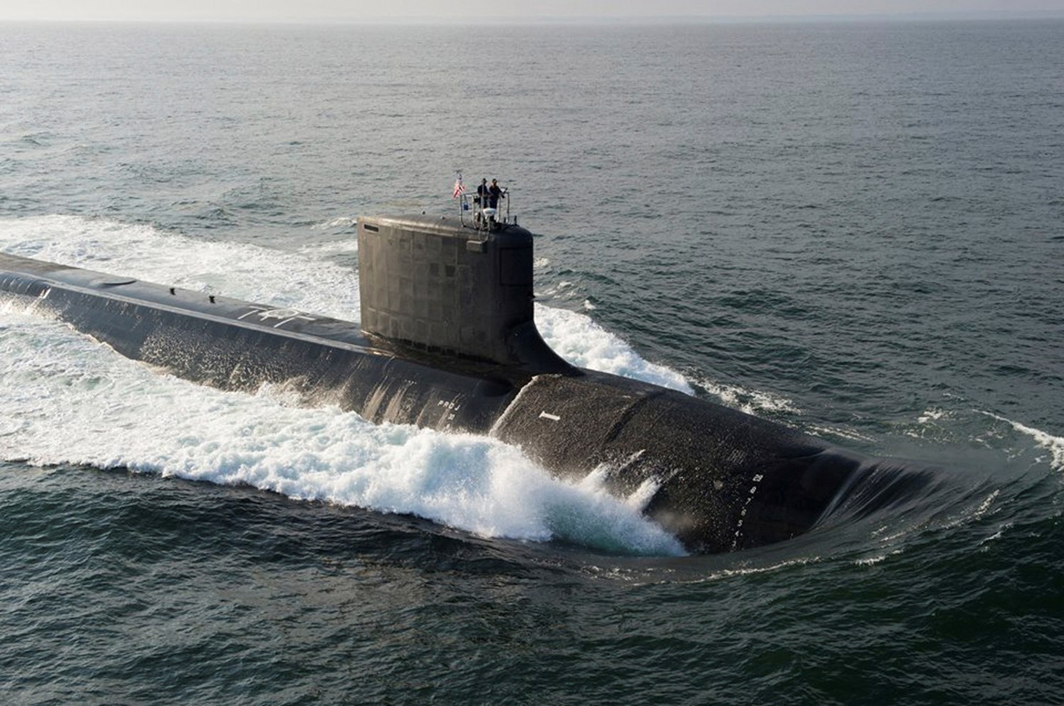 FILE PHOTO: The Virginia-class USS North Dakota (SSN 784) submarine is seen during bravo sea trials in this U.S. Navy handout picture taken in the Atlantic Ocean August 18, 2013. The Navy commissioned its newest attack submarine North Dakota, during a ceremony October 25, 2014, at Submarine Base New London in Groton, Connecticut, defense officials announced. REUTERS/U.S. Navy/Handout  (MID-SEA - Tags: MILITARY) THIS IMAGE HAS BEEN SUPPLIED BY A THIRD PARTY. IT IS DISTRIBUTED, EXACTLY AS RECEIVED BY REUTERS, AS A SERVICE TO CLIENTS. FOR EDITORIAL USE ONLY. NOT FOR SALE FOR MARKETING OR ADVERTISING CAMPAIGNS/File Photo