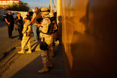 Security forces guard a trailer in which the drug crystal meth was found according to a statement from Mexican authorities, at the Attorney General's office in Ciudad Juarez, Mexico March 14, 2023. REUTERS/Jose Luis Gonzalez