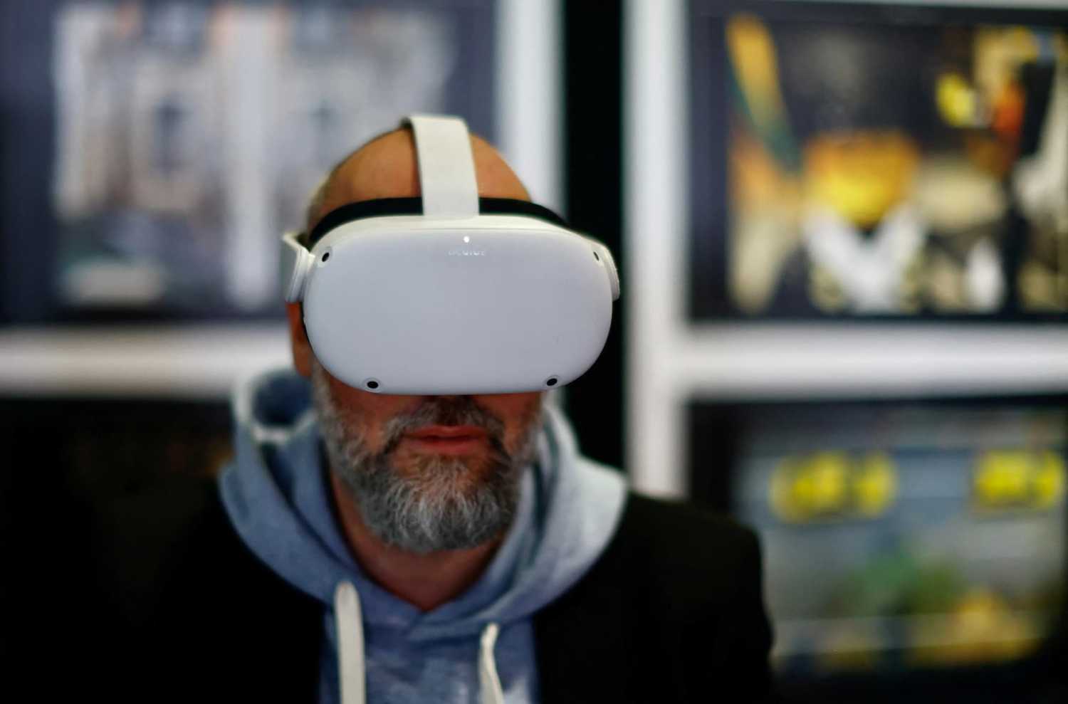 FILE PHOTO: A visitor wears virtual reality goggles at the World Artificial Intelligence Cannes Festival (WAICF) in Cannes, France, February 10, 2023. REUTERS/Eric Gaillard