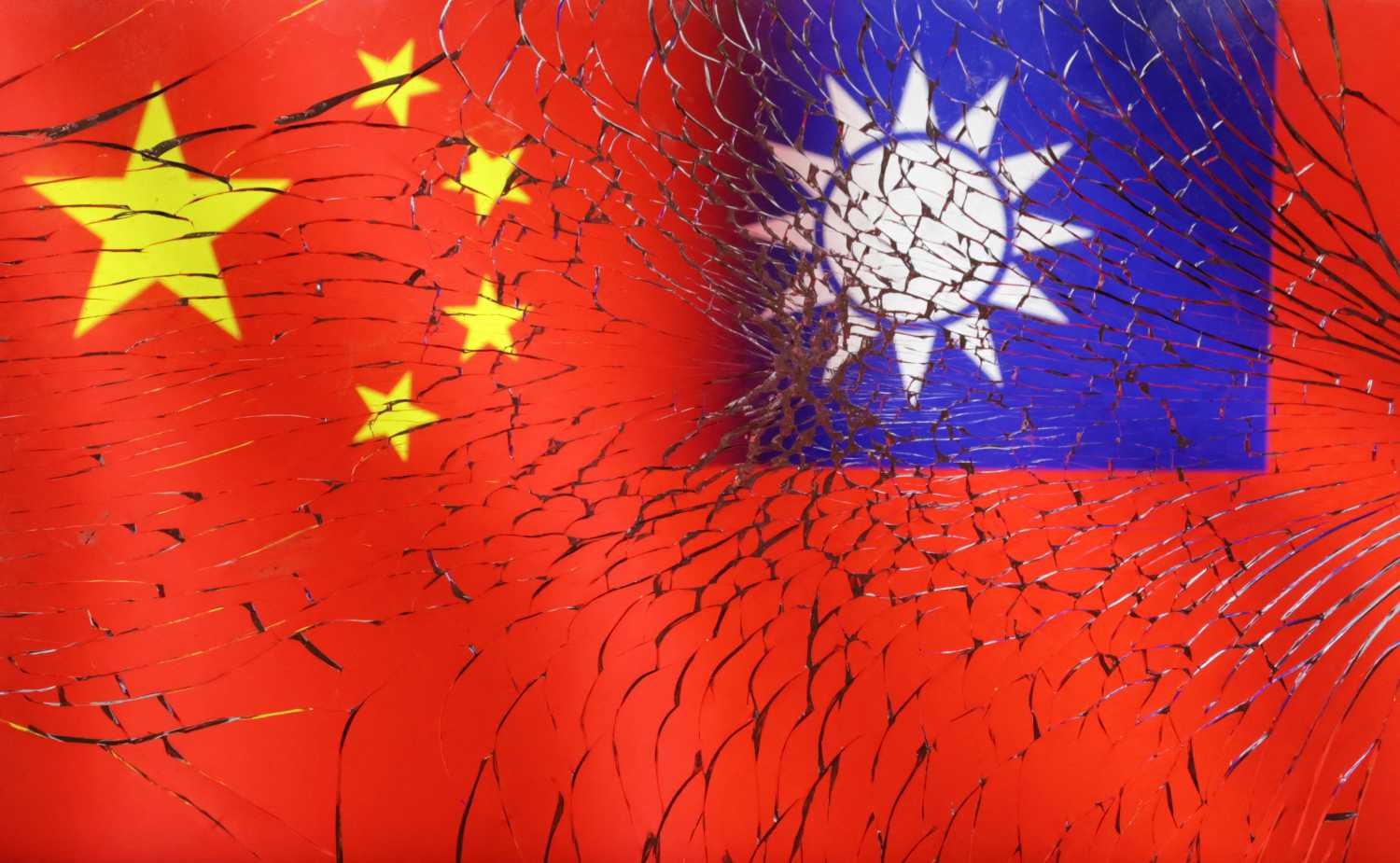 Chinese and Taiwanese flags are seen through broken glass in this illustration taken, April 11, 2023. REUTERS/Dado Ruvic/Illustration