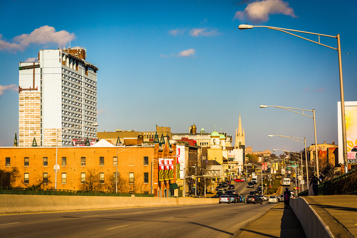 North Avenue, in Baltimore, Maryland. Sunny day with few cars on the road.