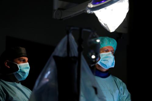 Cardiologist Benjamin Meder is pictured during a heart catheterization at the Heidelberg University Hospital (Universitaetsklinikum Heidelberg) in Heidelberg, Germany, August 14, 2018. Picture taken August 14, 2018. To match Insight HEALTHCARE-MEDICAL TECHNOLOGY/AI   REUTERS/Ralph Orlowski