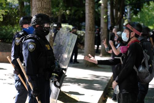 Department of Homeland Security police officers clear Black Lives Matter protesters from Terry Shrunk Plaza in Portland, Ore., on August 22, 2020. (Photo by Alex Milan Tracy/Sipa USA)No Use UK. No Use Germany.